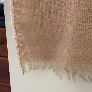 Pink blanket-like scarf